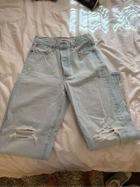 Levi’s Light Blue Distressed “Ribcage Straight Ankle”